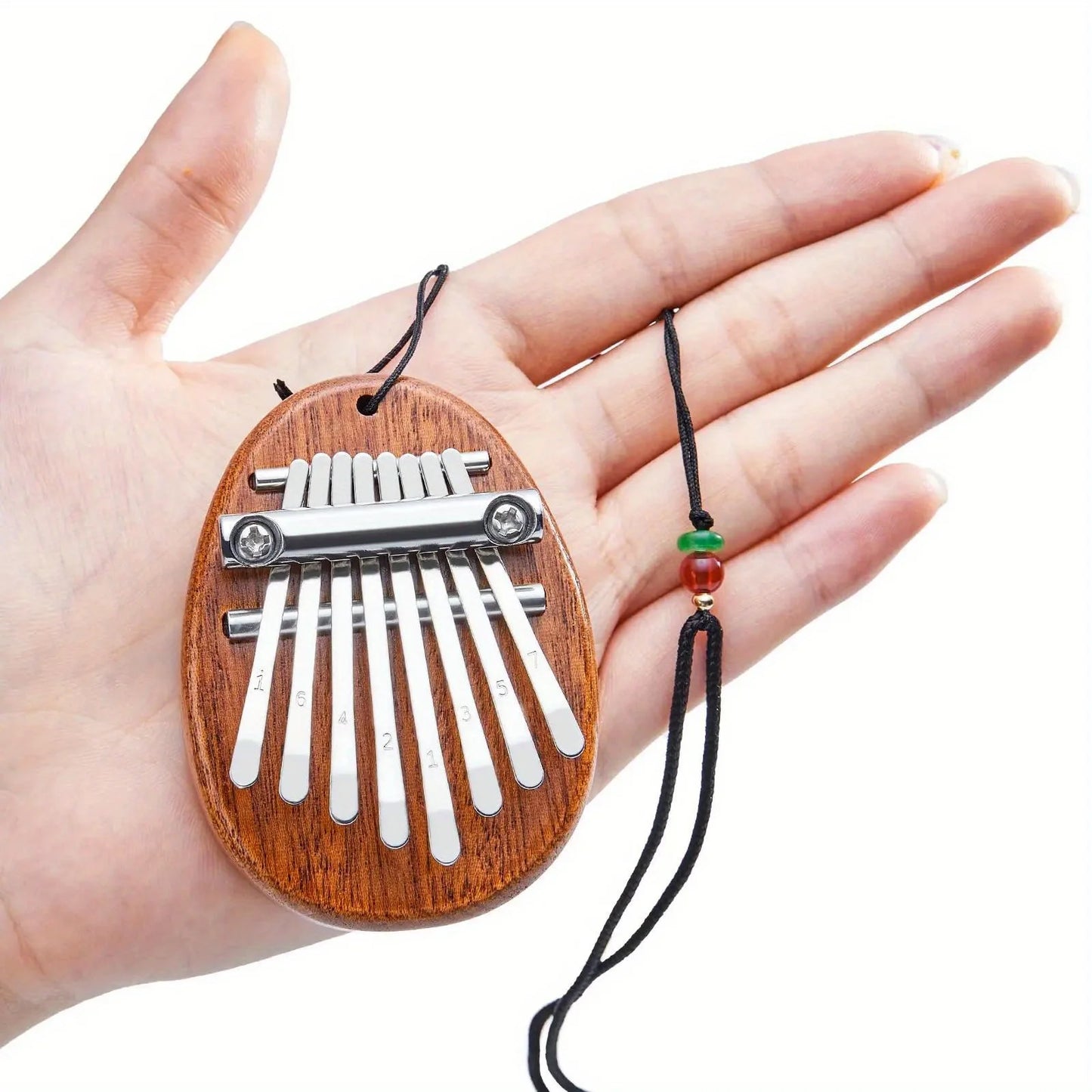 Portable 8-Key Thumb Piano – Mini Kalimba Pendant for Stress Relief & Musical Fun