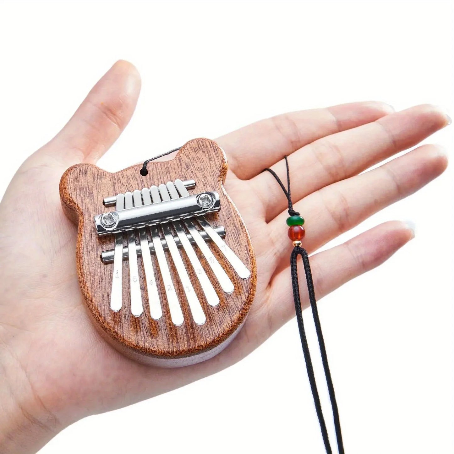 Portable 8-Key Thumb Piano – Mini Kalimba Pendant for Stress Relief & Musical Fun