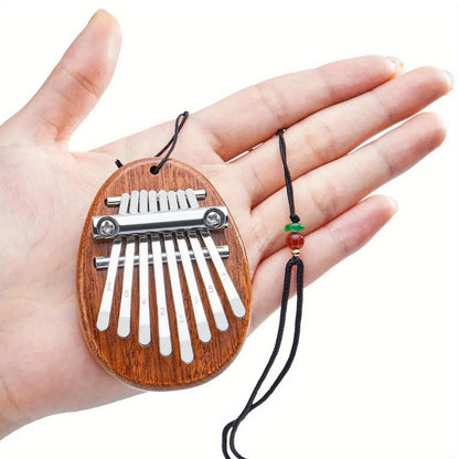 Portable 8-Key Thumb Piano – Mini Kalimba Pendant for Stress Relief & Musical Fun
